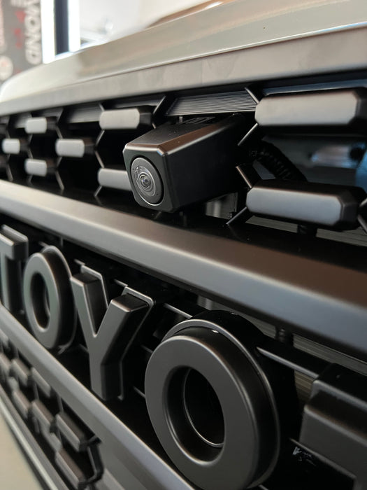Front OEM Camera Mounting Bracket for Aftermarket TRD Pro Grille 2020 - 2023 Toyota Tacoma. BACKORDER